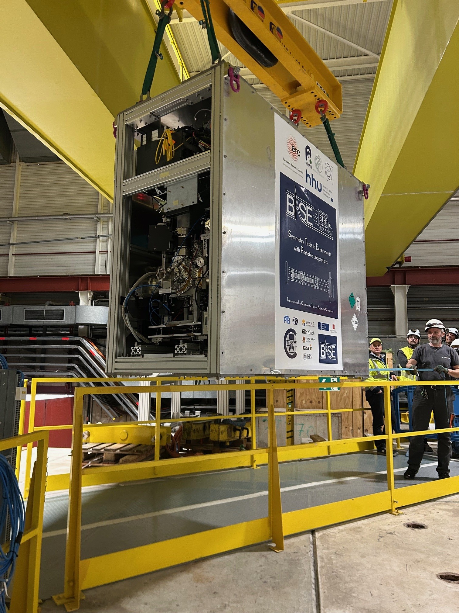 Transportable Antiproton Trap BASE-STEP loaded with antiprotons on the crane in the AD/ELENA facility of CERN